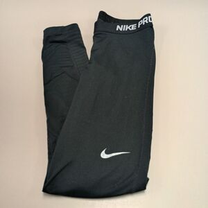 Nike Pro Dri Fit Women Leggings with Tapered Fit and Elastic Waistband Black